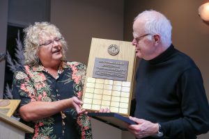 Nelson Walker receives the Newton Ball Service Award from Sherry Buttnor
