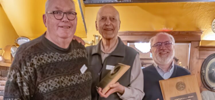 Sid Sidhu receiving the Newton-Ball Service award in 2025 from Chris Gainor and Randy Enkin