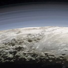 Astronomy Cafe banner image of the horizon of Pluto taken by New Horizons mission