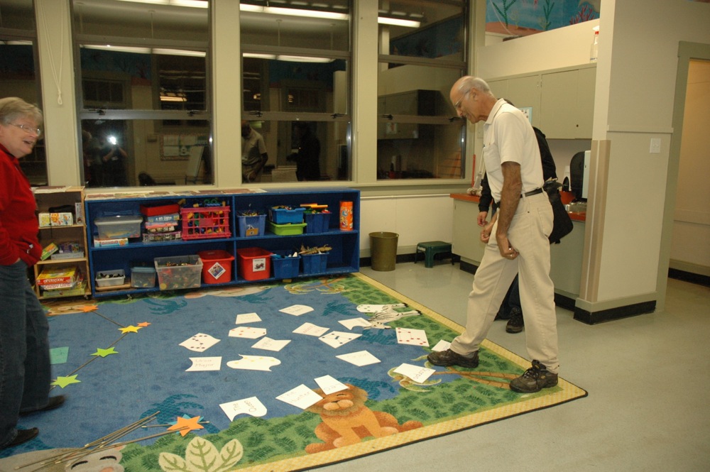 Lauri and Sid laying out a solar system display for the school outreach