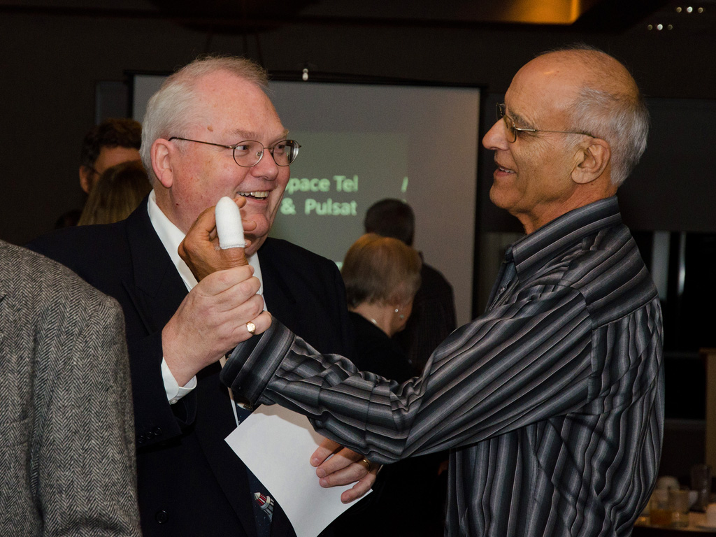 Chris Gainor admires Sid Sidhu's injured thumb at the RASC Victoria Centre AGM 2011